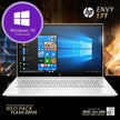 Renewed silver laptop with Windows-style start screen and visible keyboard deck