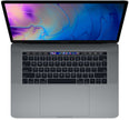 Silver Apple MacBook Pro laptop with backlit keyboard and Touch Bar.