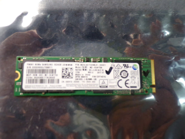 Green NVMe M.2 2280 PCIe 3.0 x4 SSD with label and gold connector edge